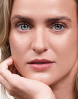 Model wearing Bouncy Mousse Multi-Use Pigment product shade Sunkissed.