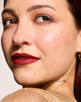Model wearing LipSense Cream product shade Vintage Rose.