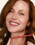 Model wearing LipSense Long-Lasting Lip Liner Pencil product shade Pink Petal.