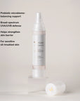 Microbiome Defense Daytime Moisturizer SPF 15 product with benefit callouts.