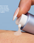Close up of GLP Complex pump dispensing a pale gel onto the skin.