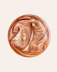 Illuminating Moisture Mist swatch shade Bronze Glow.