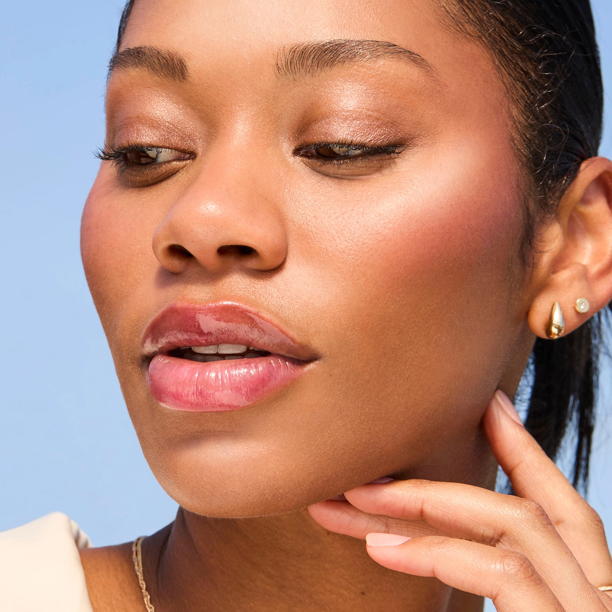 Model wearing Glowify Long-Lasting Eyeshadow Stick product shade Cocoa.