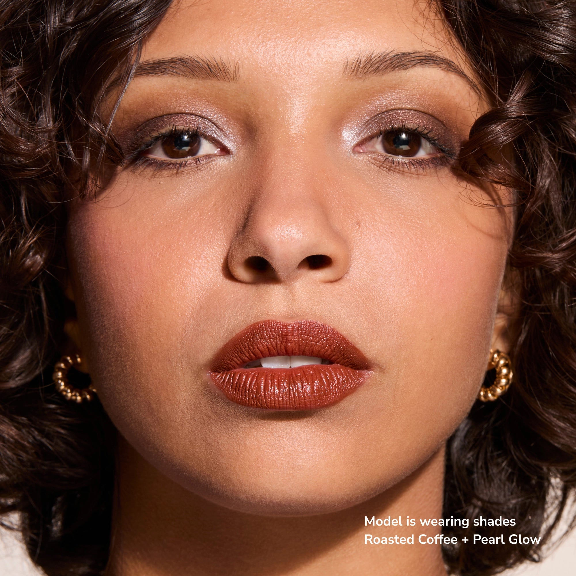 Model wearing Glowify Long-Lasting Eyeshadow Stick product shade Roasted Coffee.