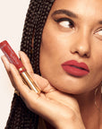 Model wearing LipSense Cream product shade Beautiful Brick.