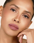 Model wearing LipSense Cream product shade Bella Satin.