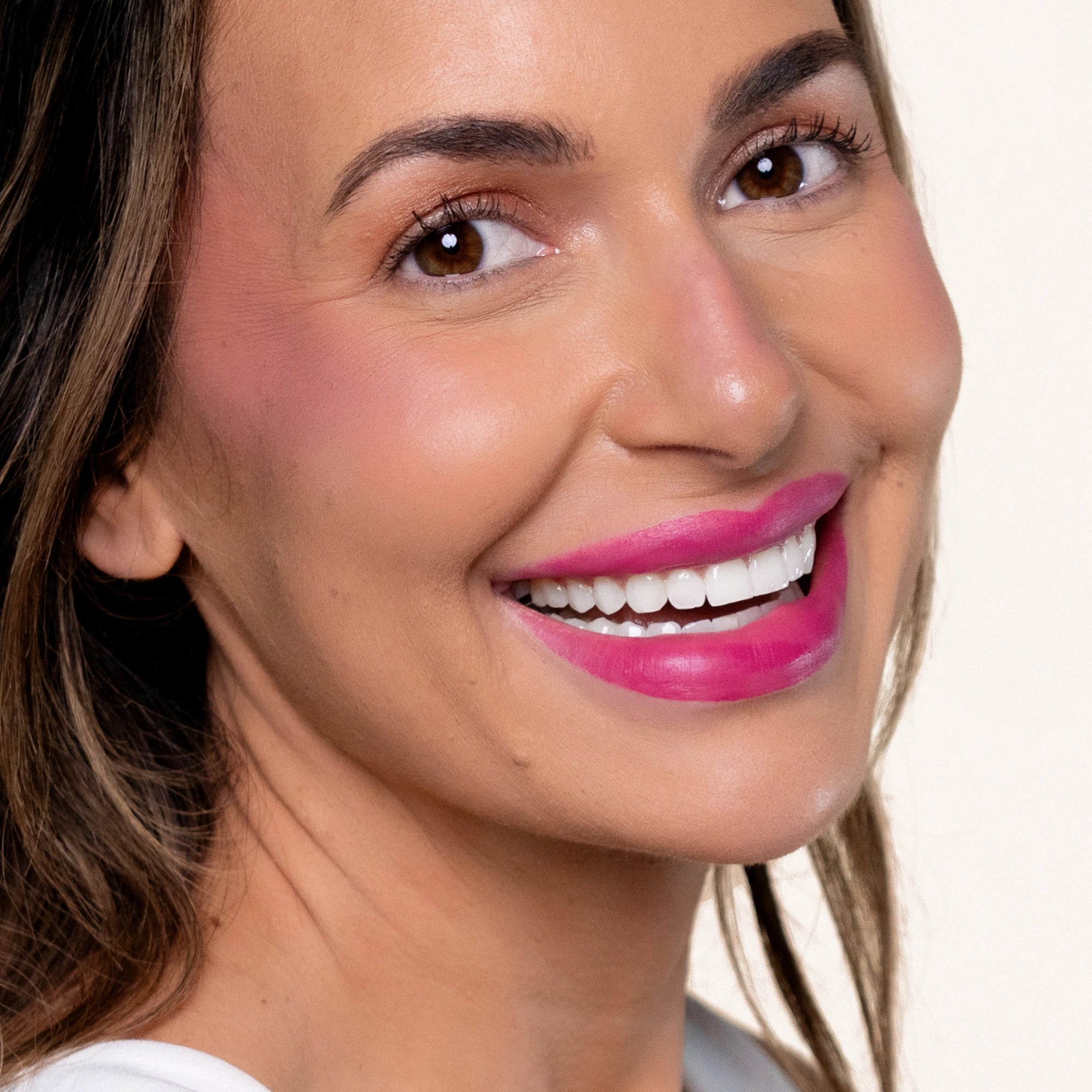 Model wearing LipSense Cream product shade Drama Queen.