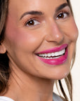 Model wearing LipSense Cream product shade Drama Queen.