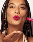 Model wearing LipSense Cream product shade Peony Pink.