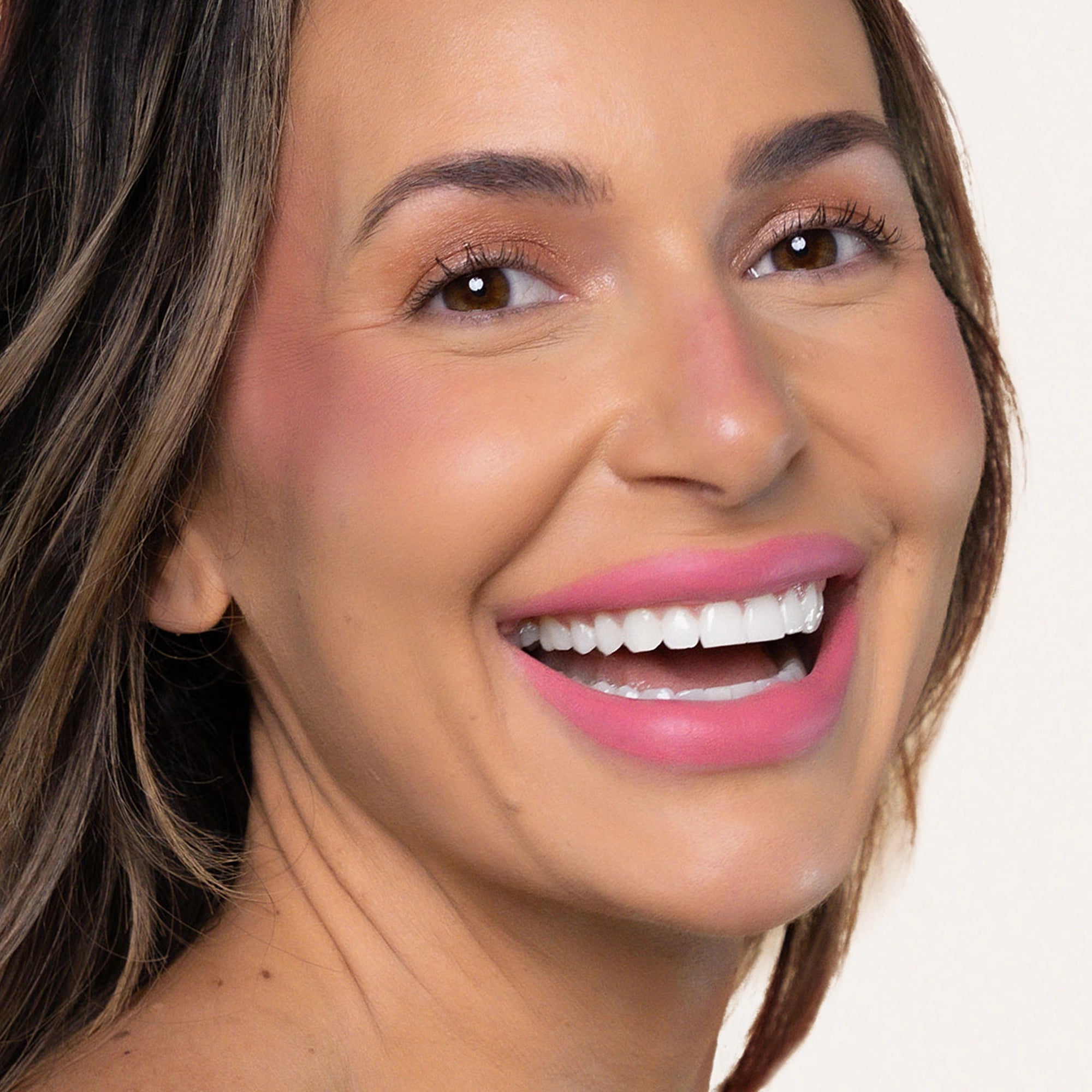 Model wearing LipSense Cream product shade Pink Suede.