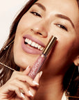 Model wearing LipSense Cream product shade Praline Rose.