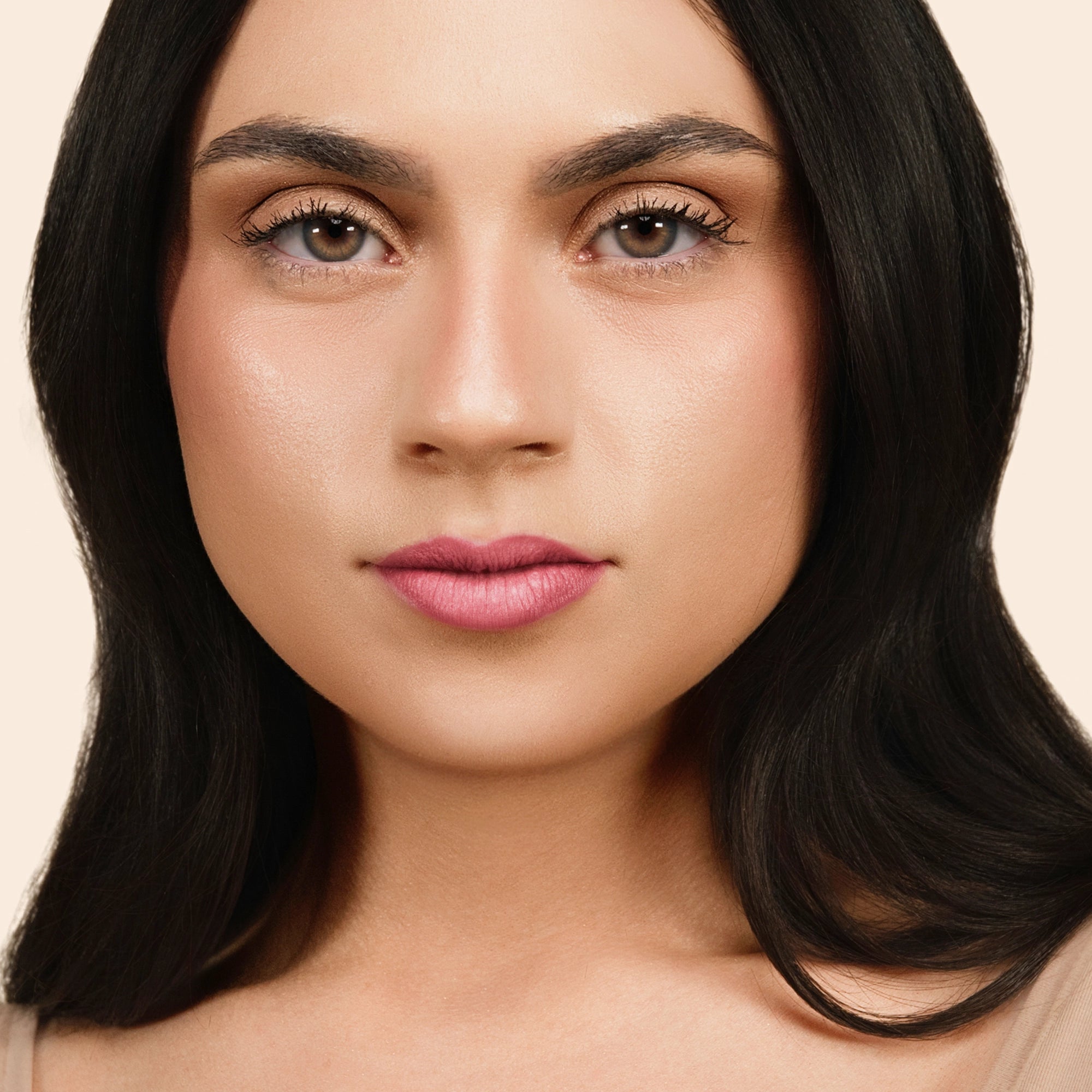 Model wearing LipSense Cream product shade Winter Rose.