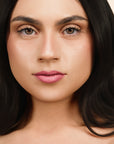 Model wearing LipSense Cream product shade Winter Rose.