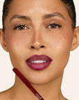 Model wearing LipSense Long-Lasting Lip Liner Pencil product shade Cherry Blaze.