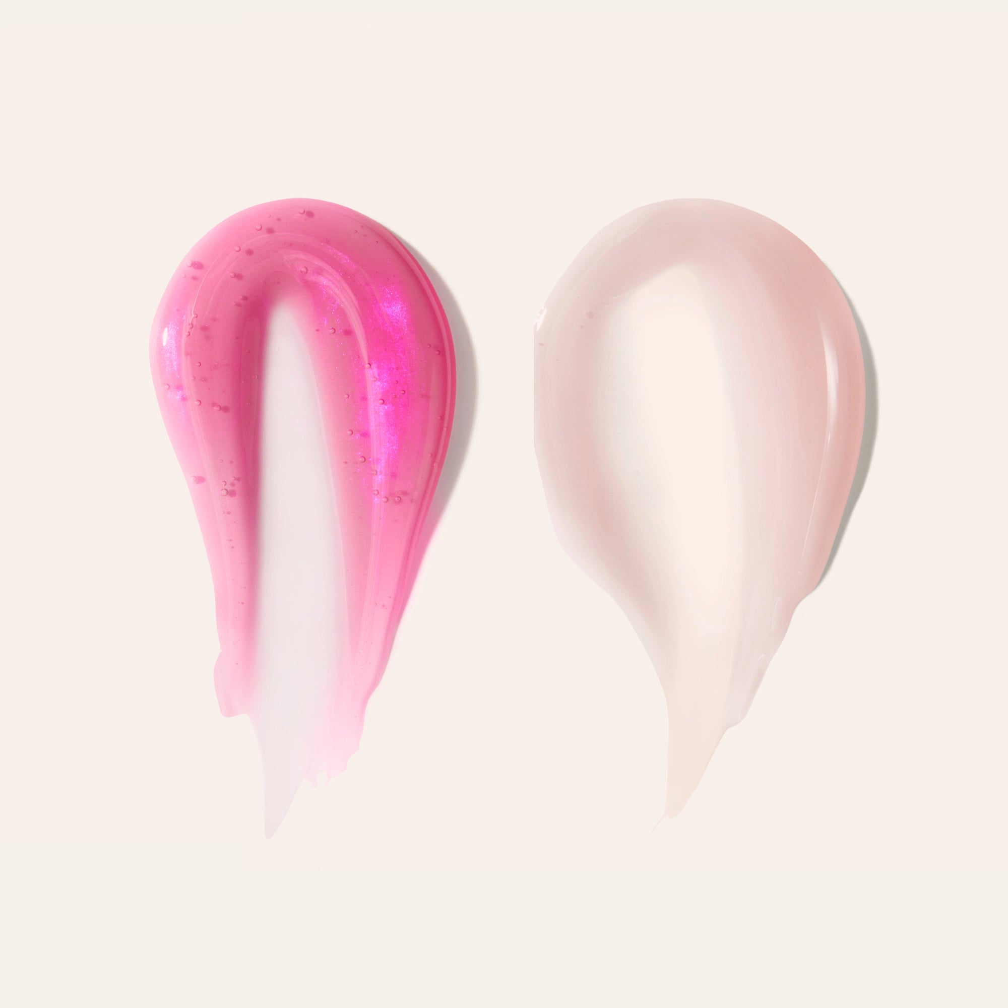 Two glossy lip tint swatches in bright pink and soft pink on a pale background