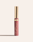 LipSense long lasting liquid lip color in a slim tube with a gold cap and rosy shade