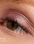 Close-up of eye wearing smoky mauve taupe shimmer from Ethereal ShadowSense Eyeshadow Duo CN, with curled lashes.