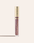 ShadowSense Eyeshadow NZL in a tall clear tube with purple glittery formula and an ornate gold cap