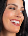 Model wearing LIpSense Lip Color shade Velvet product
