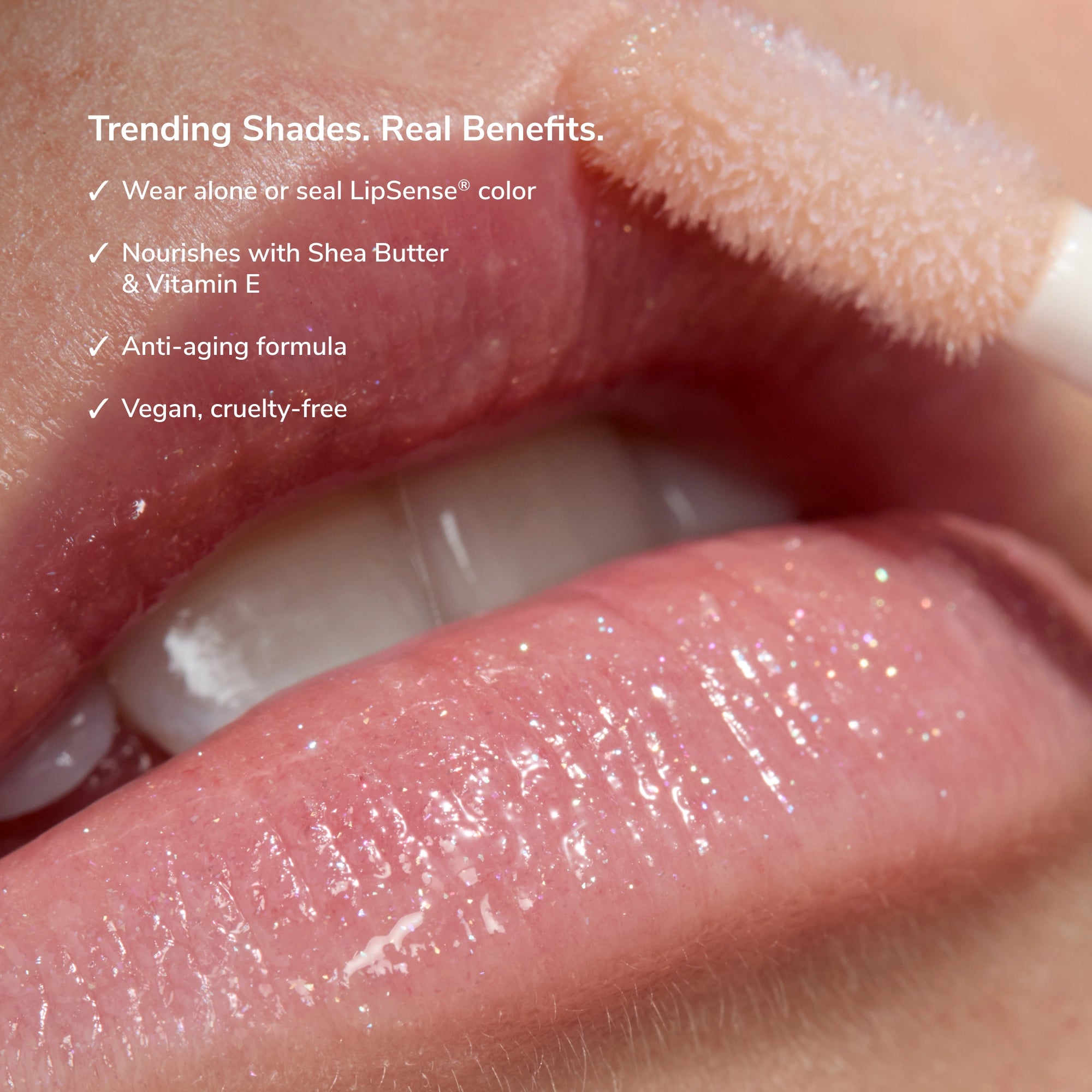 Close-up of glossy pink lips with shimmering LipSense gloss and a text overlay about trending shades.
