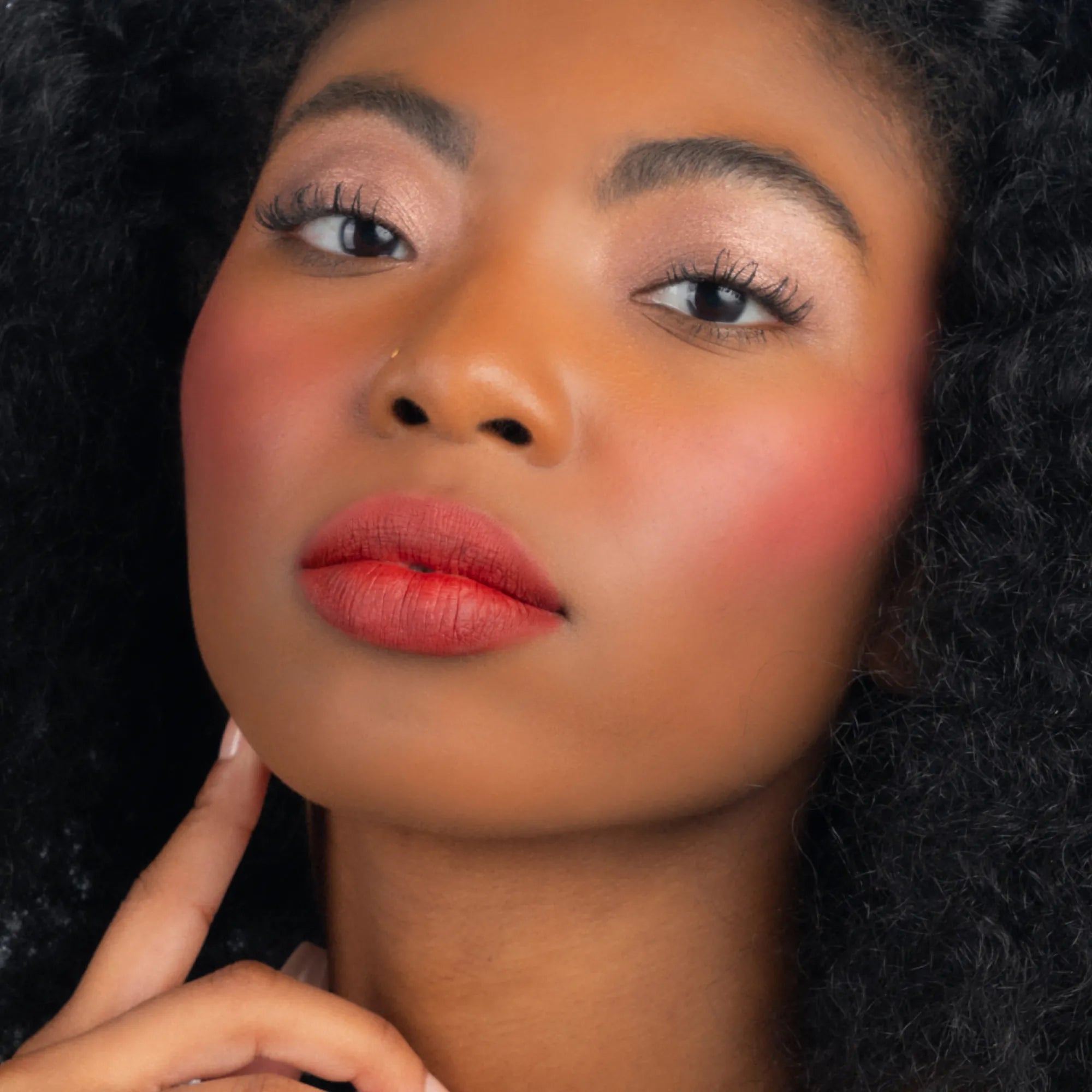 Model wearing ShadowSense product shade Candied Cocoa Shimmer